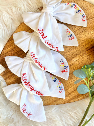 Embroidered grade bow