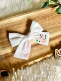 Embroidered bow