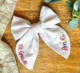 Embroidered grade bow