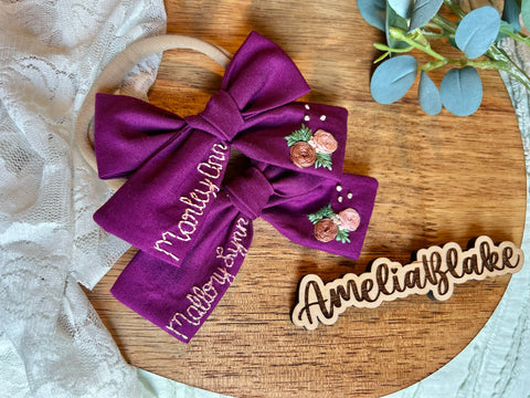 Name embroidered bow